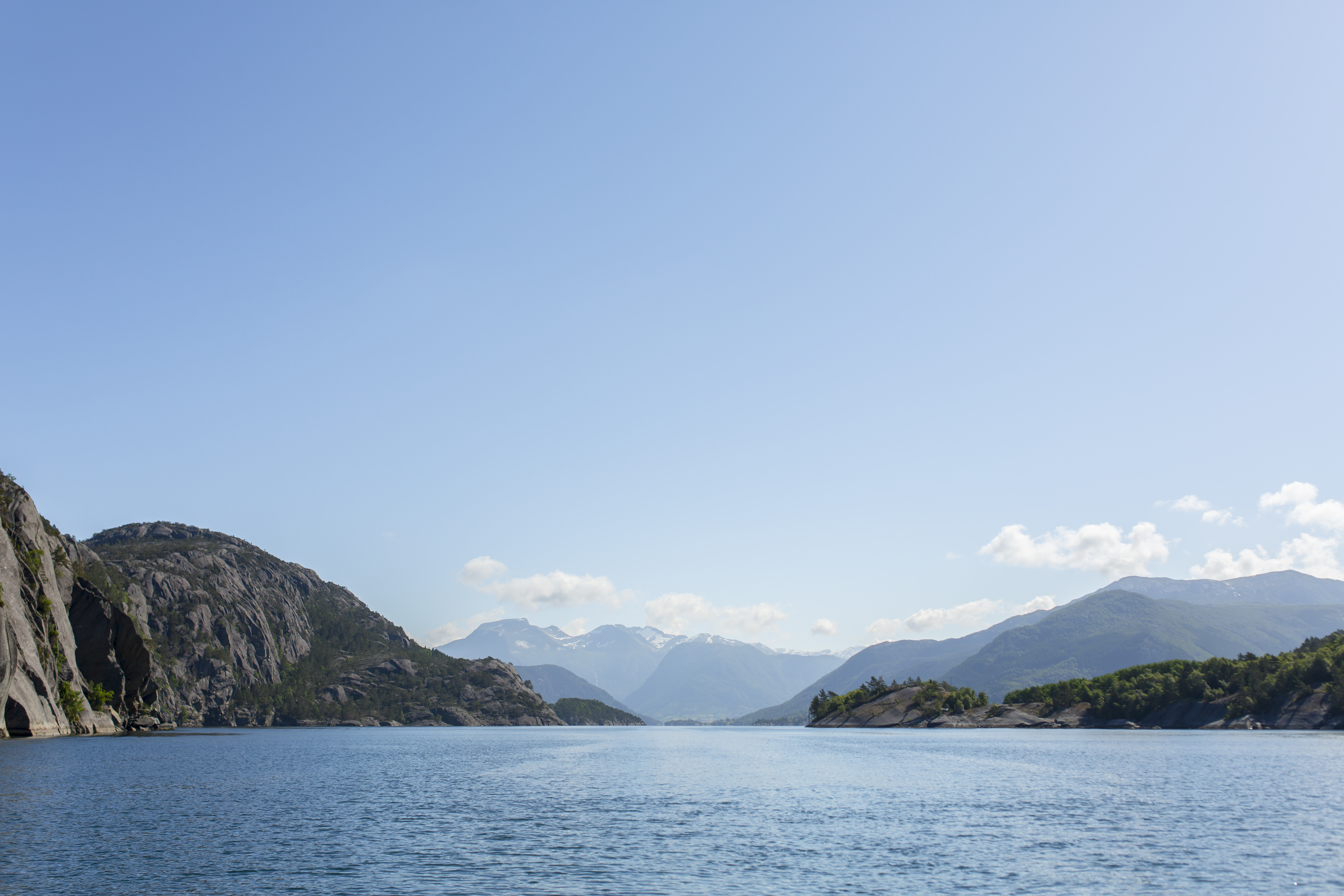 Fjord and mountains in the sun